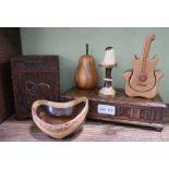 Two carved oak musical boxes with various items of treen (6)