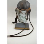 A leather flying helmet by "D. Lewis, Great Portland St London" from the 1930s/40s complete with Gos