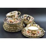 Six Royal Crown Derby ceramic trios, comprising tea plate, saucer & cup, in Imari pattern (2451)