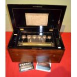 Made in Genève - a large wooden musical box numbered 24544 and 773. Large cylinder and comb