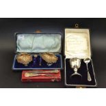 A cased pair of salts, an egg cup & spoon set, etc.