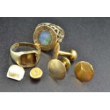 A 14k dress ring inset oval Opal, a 10k signet ring and various yellow metal studs