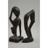 Two 20th century African wood carvings semi abstract figurative designs