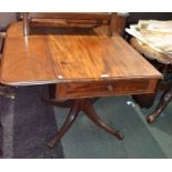 A Regency mahogany Pembroke table on four reeded legs