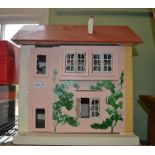 A child's four room wooden Doll's House, 36cm wide