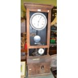 An oak cased International Time Recording Co Ltd, clocking in & out machine, a/f