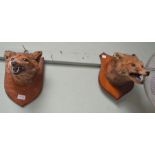 Two open mounted fox masks