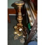 Two small pairs of candlesticks and an alter pricket candlestick