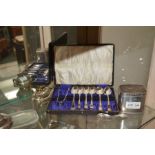 Silver tea caddy and spoon, cased silver spoons and a plated table lighter