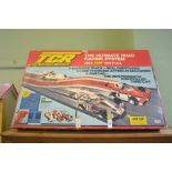 A TCR Total Control Racing set with two cars track and accessories by Ideal Toys