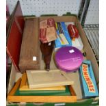 A box containing domino set, vintage hair clippers draft board etc