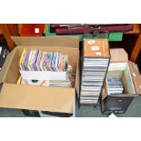 A selection of pre recorded CD's and records