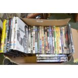 Thirty Five assorted DVDs including Top Gear and numerous adventure movies