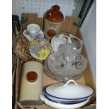 A box containing two stone hot water bottles decorative tile etc