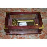 A Swiss "Reuge Music" musical box stained wood and bevel glass case 21 cm wide