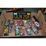 Thirteen Maisto die-cast models of Motor Racing mainly in mint condition, in original plastic displa