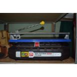 Tile cutter and an electric water tile cutter