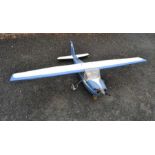 A mid-20th century model remote control aircraft, painted blue & white, with motor, (no control syst