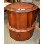 An early 20th century mahogany commode in the form of a column base