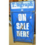 A Newspaper vendors metal '4' board sign, inscribed 'Evening Telegraph' & 'On Sale Here', with hinge
