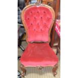 A Victorian mahogany show wood framed nursing type chair with claret velour button back