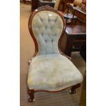 A late Victorian show wood framed salon chair, with blue button back upholstery