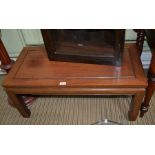 An Oriental design low rectangular topped coffee table
