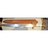 A bone and brass handled short re-enactment sword in leather scabbard