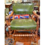A Mellowcraft armchair in dark green leather
