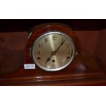 Two wooden cased mantle clocks, together with a pottery 'Black Panther' timepiece