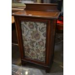 A late Victorian mahogany and satinwood inlaid music cabinet having single glazed door