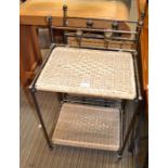A pair of metal framed folding two tier tables