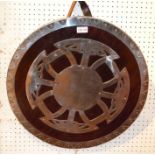 A metal and wooden combat re-enactment shield of archaic design