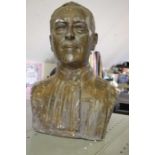 An early 20th century patinated plaster bust, considered to be a French member of the judiciary, ins