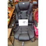 "KidzMotion" - A black leather effect office swivel chair with electronic massage function