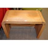 A light oak art deco design low side table