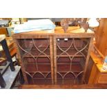 A glazed front bookcase