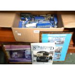 A box containing a collection of "Stratford Blue" bus die-cast models plus other related items