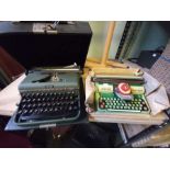Cased HALDA manual typewriter and a Mettoy 'supertype' childs example