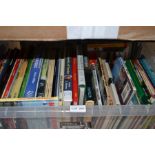 A plastic crate of books relating to lorries, buses, transport, etc.