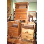 A trio of pine bedside cupboards