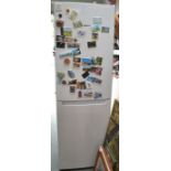 A Bosch upright fridge/freezer, magnets on the door