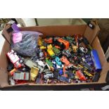 A box containing predominately Matchbox cars