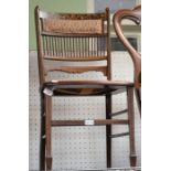 An Edwardian inlaid fancy back bedroom chair