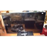 A large flat screen 42" Samsung television