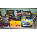 A selection of die-cast cars and vans