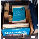 A box of paperback and hardback books including art etc