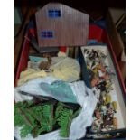 A box of vintage farmyard toys and models