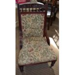 A Victorian mahogany show-wood framed ladies Drawing Room chair