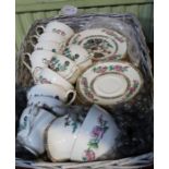 A basket containing a part Indian Tree service tea set